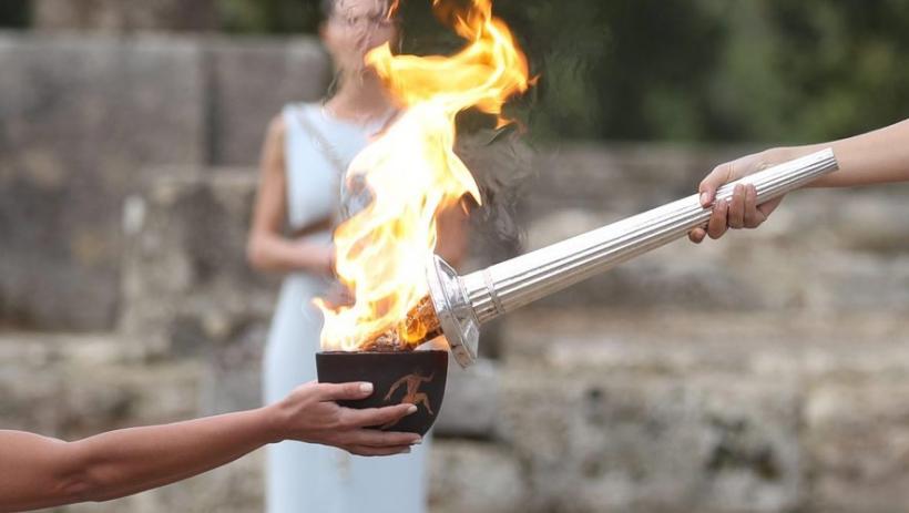 La flamme olympique au départ d'Olympie.